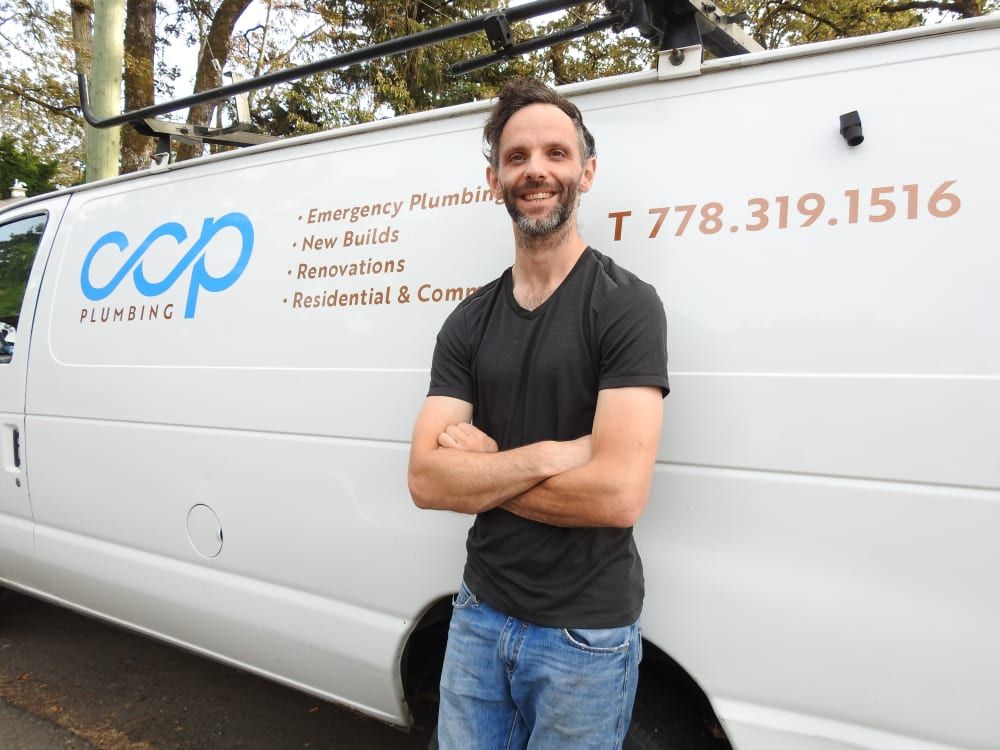 Connor posing in front of his van